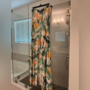 Strapless dress with shorts, open in front so like a romper and dress in one